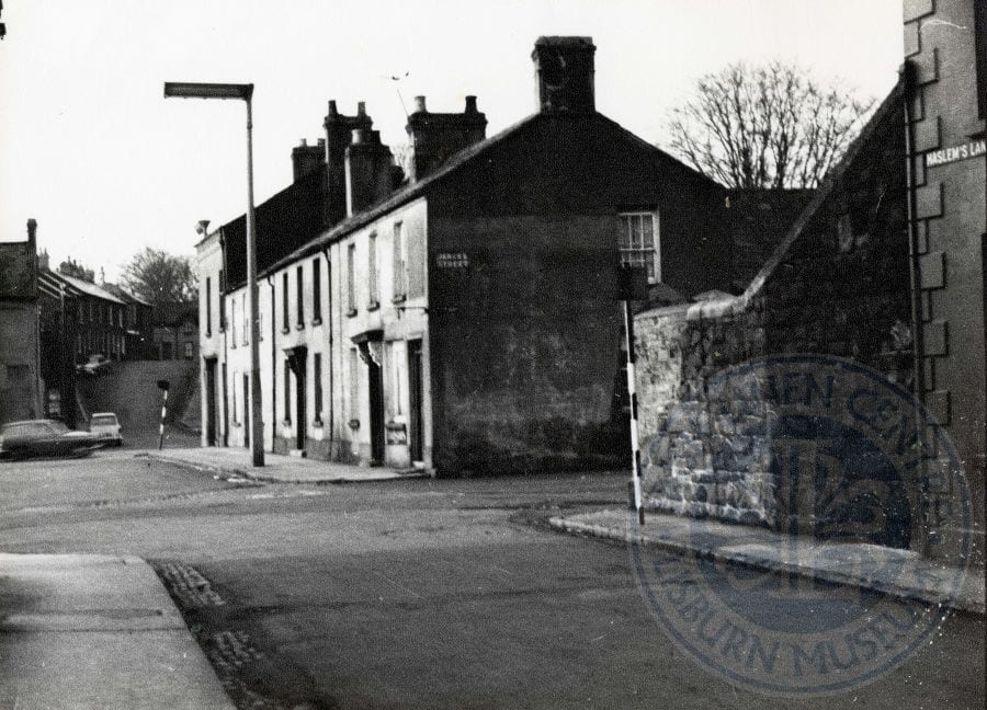 Lisburn Advent Calendar 2016 – Day 11: Haslem’s Lane, with James’s Street to the right, Smithfield, c.1964