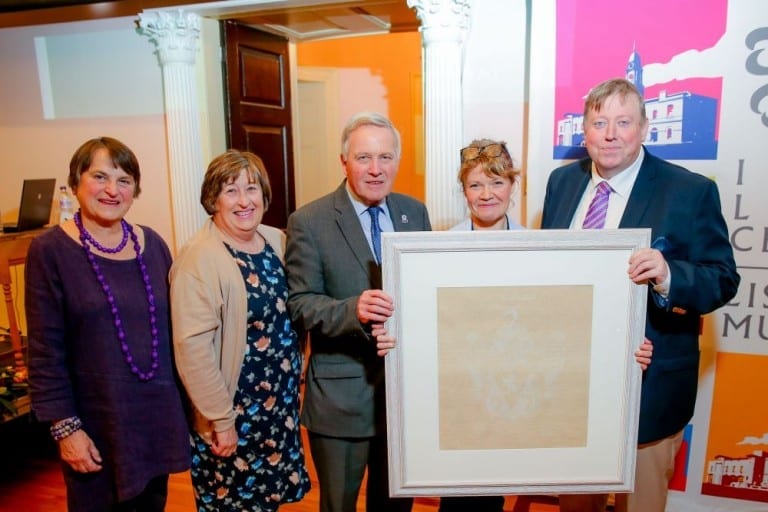 Suzanne Higgott, Rosalind Bloomfield, Councillor Brian Bloomfield MBE, Alderman Paul Porter with Deborah White, a weaver at the museum, with a framed damask napkin presented to the Wallace Collection