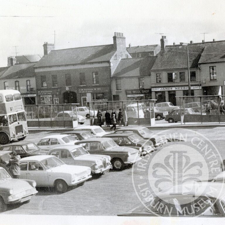 Image of cars and busses parked in Smithfield Square, Lisburn 1970s.
