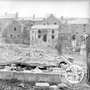 Black and white image of row of derelict houses located behind Bridge street. c.1969 Image taken by H.Duff and donated to ILCLM