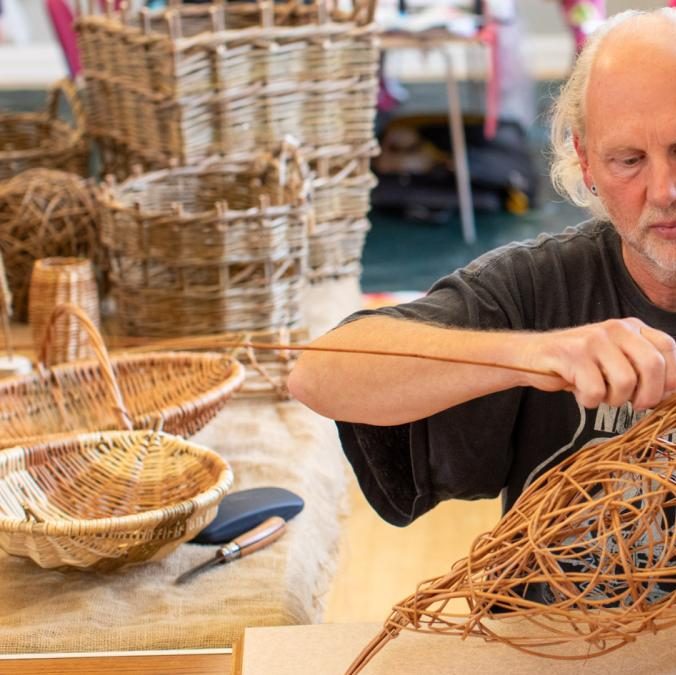Clive Lyttle from Welig Heritage Crafts demonstrating willow weaving in Ards Arts Centre