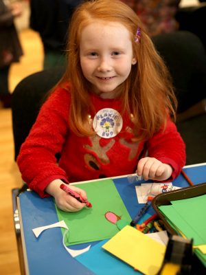 LCCC LINEN 19 Little girl crafting at the Lisburn Museum summer workshop